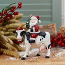 Santa on Cow