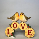 Two Christmas Robins on Love Logs