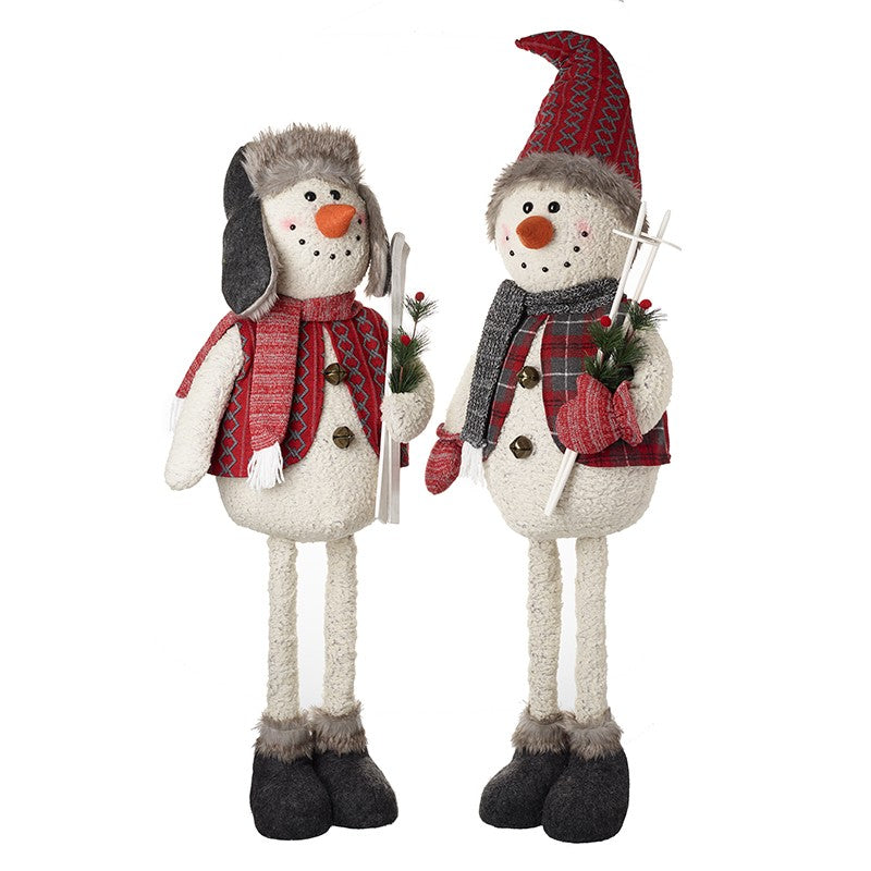 Tall Snowmen Carrying Skis