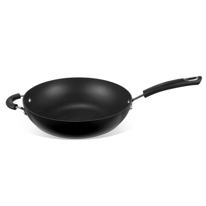 A black hard anodized 30cm stir fry wok pan with a handle.