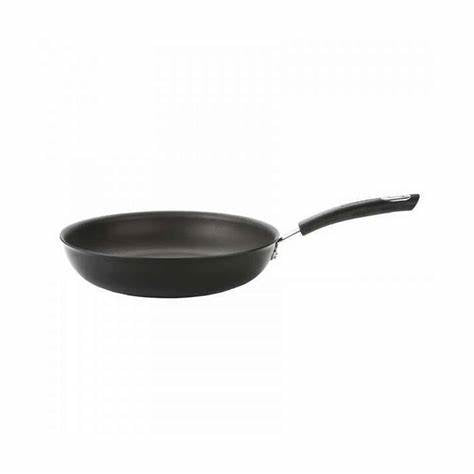 A black hard anodized skillet with a comfortable handle.